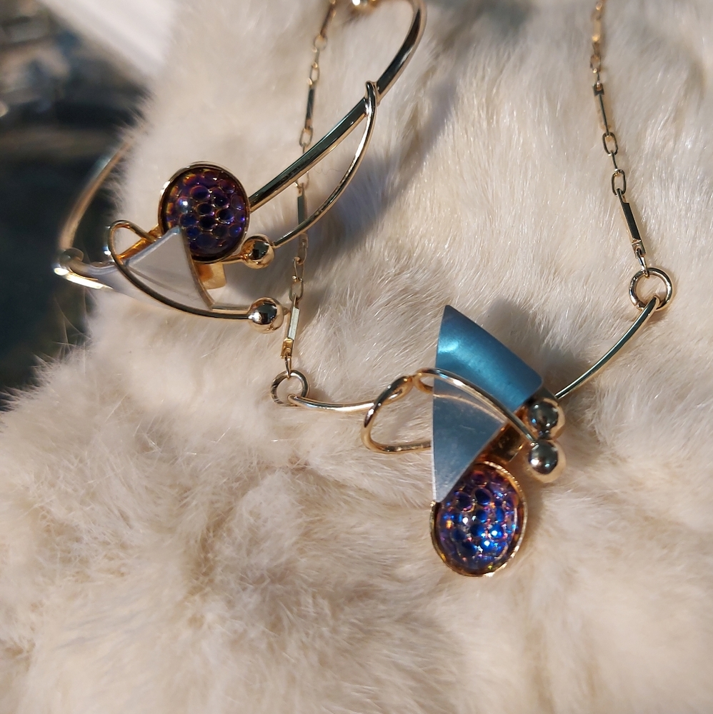 Bangle and necklace set by Christopher Poly
